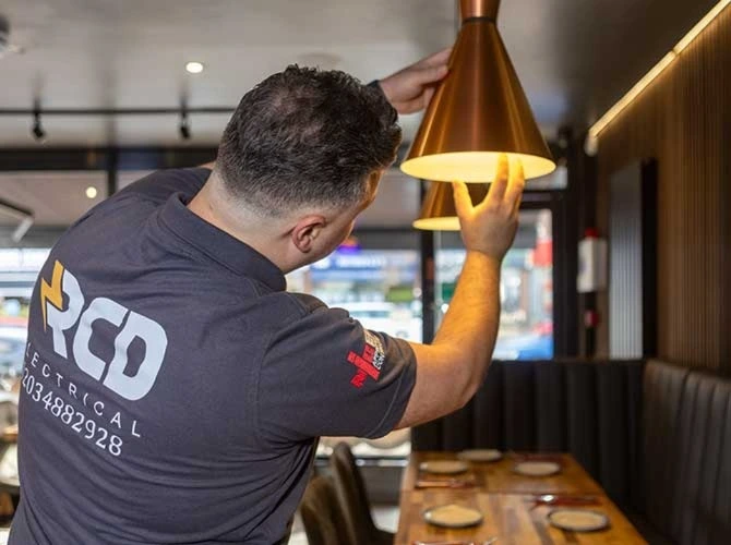 RCD Electrical electrician carrying out commercial electrical work in London